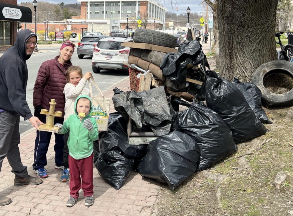 Spring Cleanup Haul results, featuring the winning team holding their trophy.