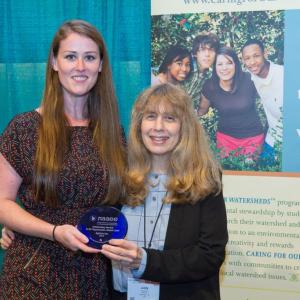 NAAEE Executive Director Judy Braus presents Agrium Program Coordinator Lindsey Metheral with the award for Outstanding Service to EE by an Organization at the Global Level at NAAEE's 2015 Annual Conference in San Diego, CA.