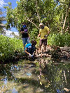 Derek Esibill and Kilo Kai students taking water samples. 