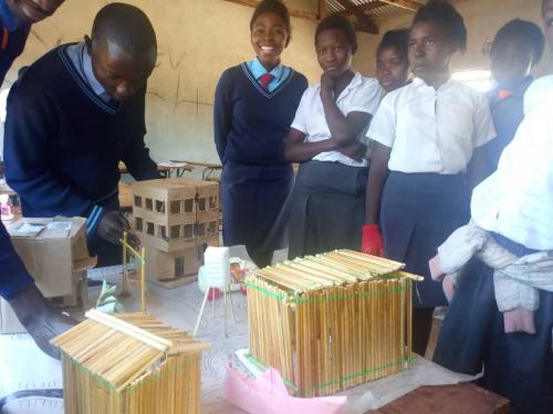 Students in Zambia work on their HouseStories models