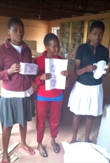 Lenana Girls Secondary School in Kenya explaining how they produced the pads from sugar cane waste